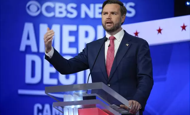 Republican vice presidential nominee Sen. JD Vance, R-Ohio, speaks during a vice presidential debate hosted by CBS News, with Democratic vice presidential candidate Minnesota Gov. Tim Walz, Tuesday, Oct. 1, 2024, in New York. (AP Photo/Matt Rourke)