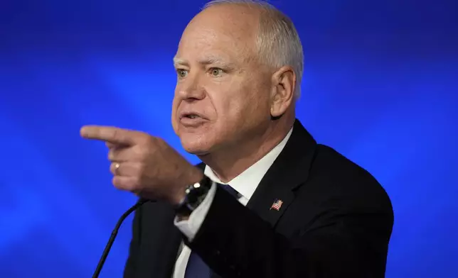 Democratic vice presidential nominee Minnesota Gov. Tim Walz speaks during a vice presidential debate hosted by CBS News, with Republican vice presidential nominee Sen. JD Vance, R-Ohio, Tuesday, Oct. 1, 2024, in New York. (AP Photo/Matt Rourke)