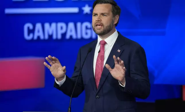 Republican vice presidential nominee Sen. JD Vance, R-Ohio, speaks during a vice presidential debate hosted by CBS News, with Democratic vice presidential candidate Minnesota Gov. Tim Walz, Tuesday, Oct. 1, 2024, in New York. (AP Photo/Matt Rourke)