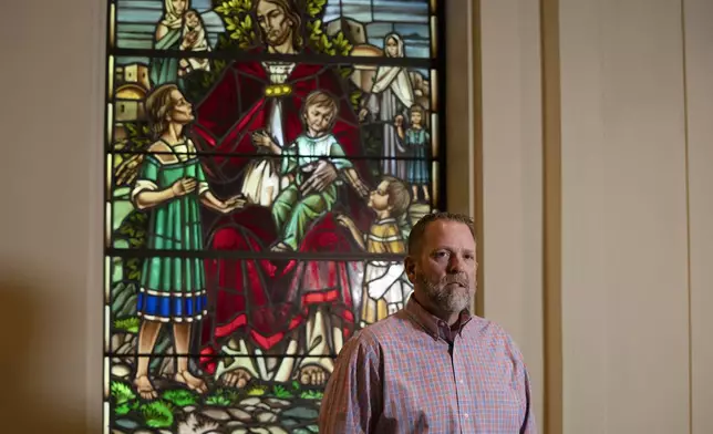 Pastor Rob Pochek of First Baptist Church poses for a portrait Oct. 10, 2024, in Charlottesville, Va. (AP Photo/Serkan Gurbuz)