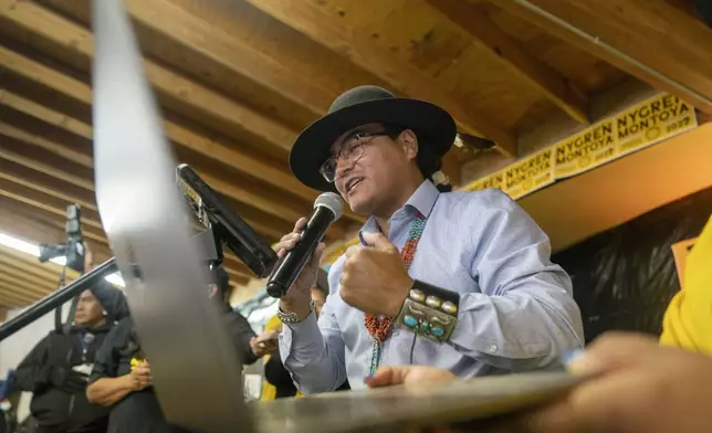 FILE - Buu Nygren announces his win for the Navajo Nation president as he reads tabulated votes from chapter houses across the reservation at his campaign's watch party at the Navajo Nation fairgrounds in Window Rock, Ariz., on Tuesday, Nov. 8, 2022. (AP Photo/William C. Weaver IV, File)