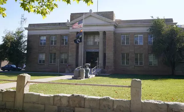 FILE - The Apache County Superior Courthouse shown here Thursday, Oct. 22, 2020, in St. Johns, Ariz. (AP Photo/Ross D. Franklin, File)