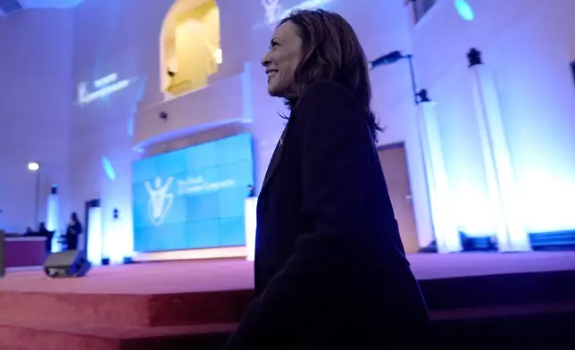 Democratic presidential nominee Vice President Kamala Harris departs the stage after speaking during a service at the Church of Christian Compassion, Sunday, Oct. 27, 2024, in Philadelphia. (AP Photo/Susan Walsh)