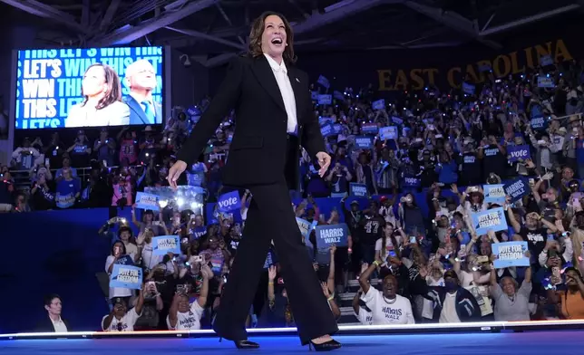 Democratic presidential nominee Vice President Kamala Harris arrives to speak at a campaign rally at East Carolina University in Greenville, N.C., Sunday, Oct. 12, 2024. (AP Photo/Susan Walsh)