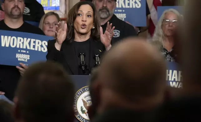 Democratic presidential nominee Vice President Kamala Harris speaks at UAW Local 652 during a campaign event in Lansing, Mich., Friday, Oct. 18, 2024. (AP Photo/Jacquelyn Martin)