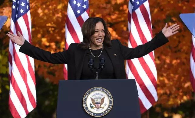 Democratic presidential nominee Vice President Kamala Harris speaks at a campaign rally in Riverside Park, Friday, Oct. 18, 2024, in Grand Rapids, Mich. (AP Photo/Paul Sancya)