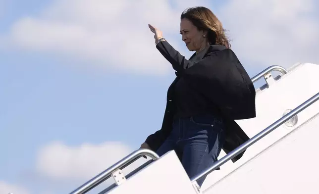 Democratic presidential nominee Vice President Kamala Harris arrives on Air Force Two at Charlotte Douglas International Airport, Saturday, October 5, 2024, in Charlotte, N.C., for a briefing on the damage from Hurricane Helene. (AP Photo/Chris Carlson)