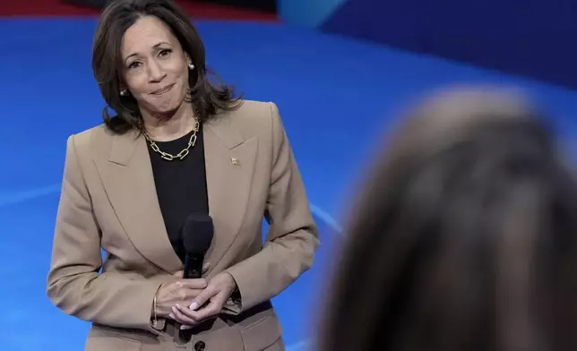 Democratic presidential nominee Vice President Kamala Harris listens during a Town Hall event hosted by Univision, Thursday, Oct. 10, 2024, at the University of Nevada Las Vegas. (AP Photo/Jacquelyn Martin)