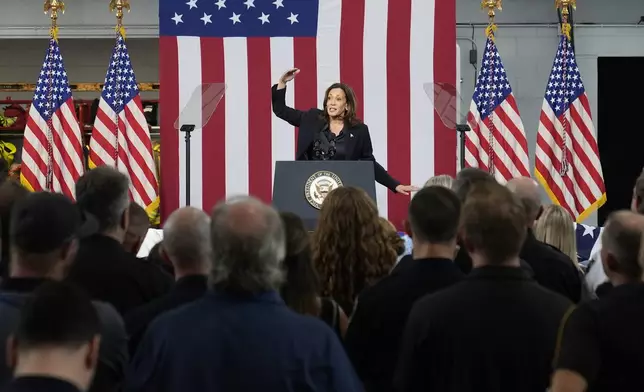 Democratic presidential nominee Vice President Kamala Harris speaks at the Redford Township Fire Department North Station, Friday, Oct. 4, 2024, in Redford Township, Mich. (AP Photo/Paul Sancya)