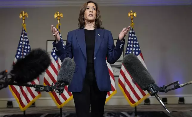 Democratic presidential nominee Vice President Kamala Harris speaks to reporters in Houston, Friday, Oct. 25, 2024. (AP Photo/Susan Walsh)