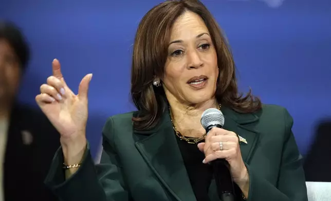 Democratic presidential nominee Vice President Kamala Harris and former Rep. Liz Cheney, R-Wyo., attend a campaign event Monday, Oct. 21, 2024, in Brookfield, Wis. (AP Photo/Morry Gash)