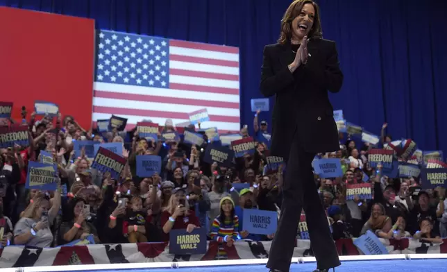 Democratic presidential nominee Vice President Kamala Harris arrives during a campaign event at the PA Farm Show Complex and Expo Center, Wednesday, Oct. 30, 2024, in Harrisburg, Pa. (AP Photo/Matt Rourke)