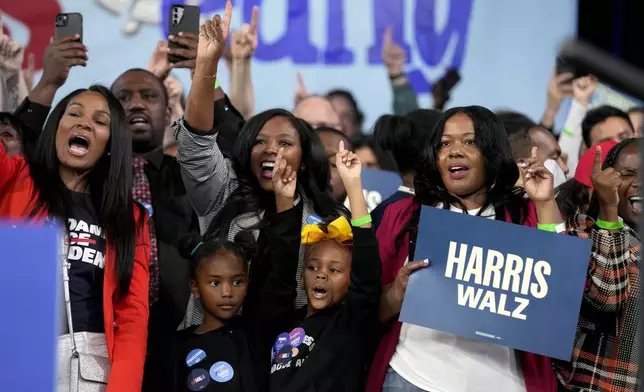 Supporters cheer as Philadelphia Mayor Cherelle Parker speaks during a community rally with Democratic presidential nominee Vice President Kamala Harris at the Alan Horwitz "Sixth Man" Center, Sunday, Oct. 27, 2024, in Philadelphia. (AP Photo/Susan Walsh)