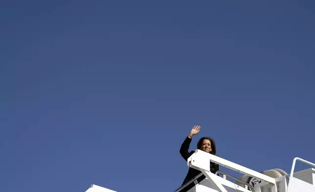 Democratic presidential candidate Vice President Kamala Harris boards Air Force Two at Joint Base Andrews, Md., Wednesday, Oct. 23, 2024. (Erin Schaff//The New York Times via AP, Pool)