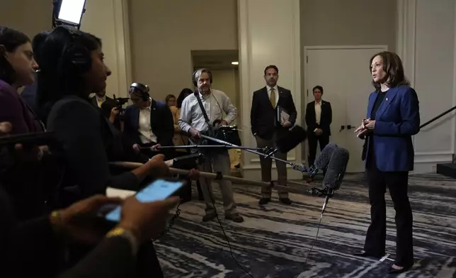 Democratic presidential nominee Vice President Kamala Harris speaks to reporters in Houston, Friday, Oct. 25, 2024. (AP Photo/Susan Walsh)