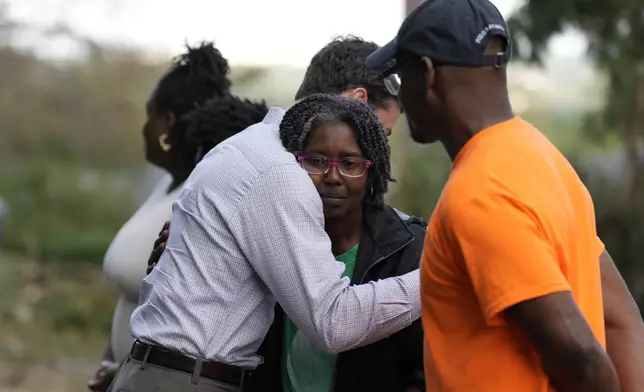 Sen. Jon Ossoff, D-Ga., greets people who were impacted by Hurricane Helene in Augusta, Ga., Wednesday, Oct. 2, 2024, during a visit with Democratic presidential nominee Vice President Kamala Harris. (AP Photo/Carolyn Kaster)