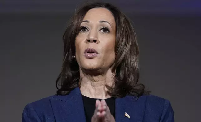 Democratic presidential nominee Vice President Kamala Harris speaks to reporters in Houston, Friday, Oct. 25, 2024. (AP Photo/Susan Walsh)