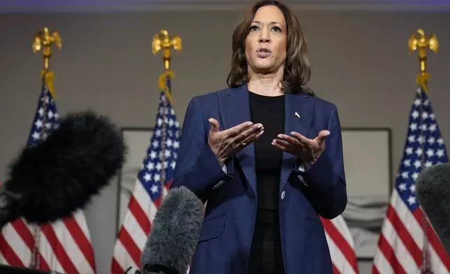 Democratic presidential nominee Vice President Kamala Harris speaks to reporters in Houston, Friday, Oct. 25, 2024. (AP Photo/Susan Walsh)