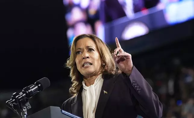 Democratic presidential nominee Vice President Kamala Harris speaks at a rally in Houston, Friday, Oct. 25, 2024. (AP Photo/Susan Walsh)