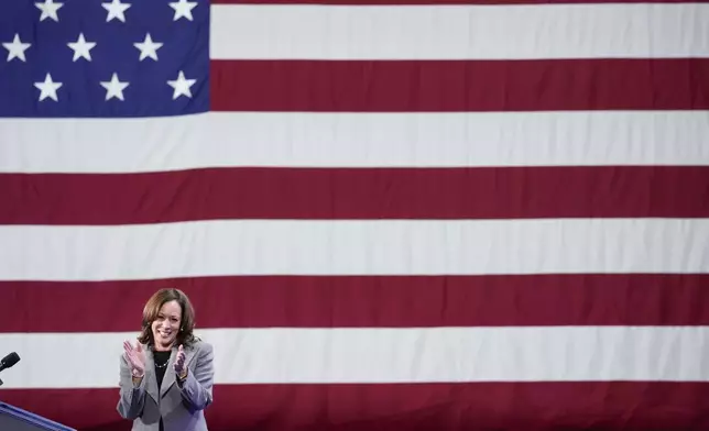 Democratic presidential nominee Vice President Kamala Harris reacts to the crowd during a campaign event at Lakewood Amphitheatre, Saturday, Oct. 19, 2024, in Atlanta. (AP Photo/Brynn Anderson)