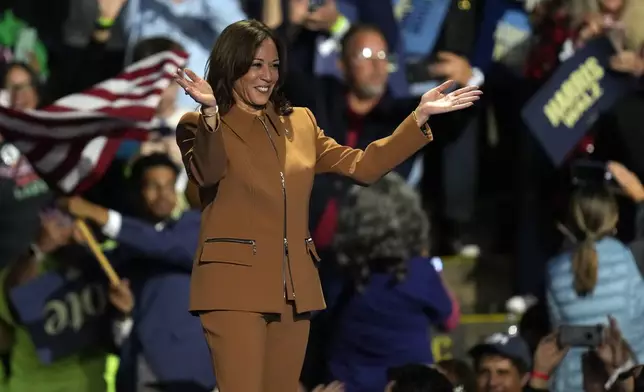 Democratic presidential nominee Vice President Kamala Harris departs after speaking at a campaign rally at the Wings Event Center, Saturday, Oct. 26, 2024, in Kalamazoo, Mich. (AP Photo/Paul Sancya)