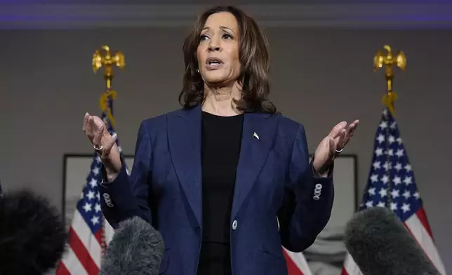 Democratic presidential nominee Vice President Kamala Harris speaks to reporters in Houston, Friday, Oct. 25, 2024. (AP Photo/Susan Walsh)