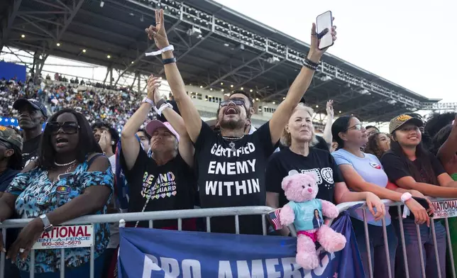 Giovanni Castro cheers before Democratic presidential nominee Vice President Kamala Harris takes the stage at a campaign rally Friday, Oct. 25, 2024, in Houston. (AP Photo/Annie Mulligan)