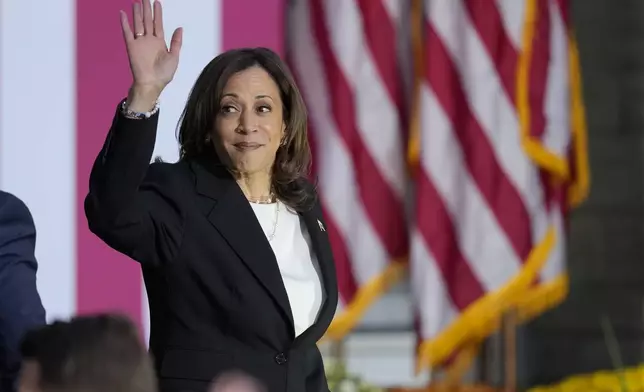 Democratic presidential nominee Vice President Kamala Harris waves as she departs after speaking at a campaign rally at Ripon College, Thursday, Oct. 3, 2024, in Ripon, Wis. (AP Photo/Charlie Neibergall)