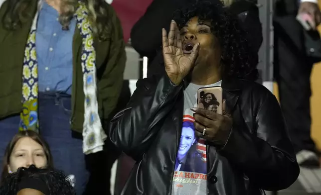 A supporter cheers as Democratic presidential nominee Vice President Kamala Harris arrives to speak during a campaign rally at Erie Insurance Arena, in Erie, Pa., Monday, Oct. 14, 2024. (AP Photo/Jacquelyn Martin)