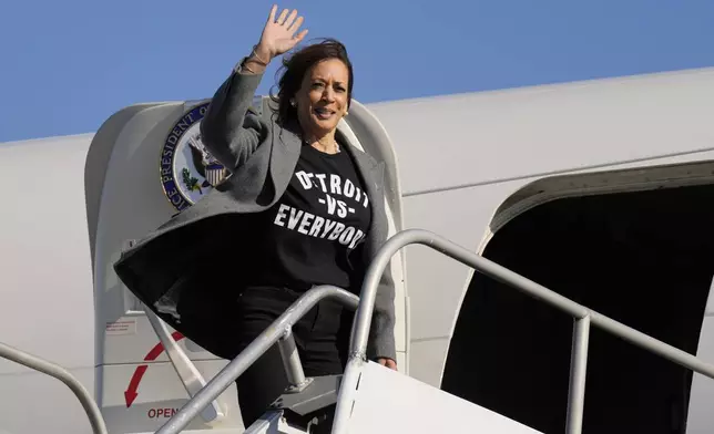 Democratic presidential nominee Vice President Kamala Harris boards Air Force Two as she departs from Detroit Metropolitan Wayne County Airport in Detroit, Saturday, Oct. 19, 2024, en route to Atlanta. (AP Photo/Jacquelyn Martin, Pool)