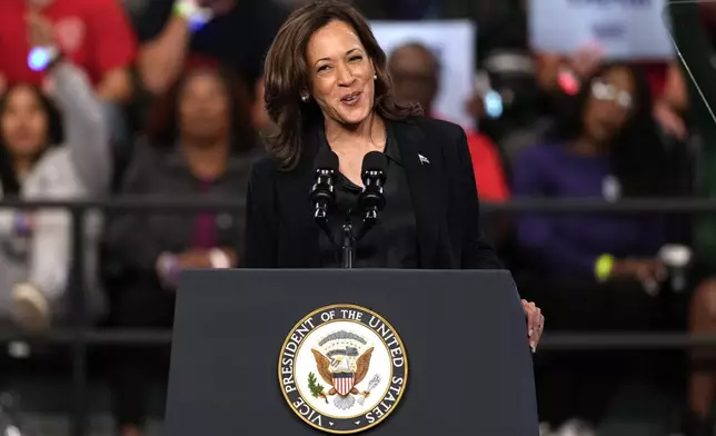 Democratic presidential nominee Vice President Kamala Harris speaks during a campaign rally at the Dort Financial Center in Flint, Mich., Friday, Oct. 4, 2024. (AP Photo/Carolyn Kaster)