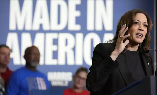 Democratic presidential nominee Vice President Kamala Harris speaks at UAW Local 652 during a campaign event in Lansing, Mich., Friday, Oct. 18, 2024. (AP Photo/Jacquelyn Martin)