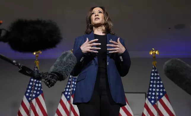 Democratic presidential nominee Vice President Kamala Harris speaks to reporters in Houston, Friday, Oct. 25, 2024. (AP Photo/Susan Walsh)