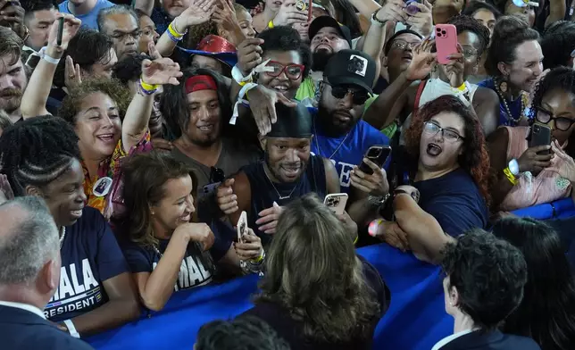 Democratic presidential nominee Vice President Kamala Harris shaking hands with supporters after speaking at a rally in Houston, Friday, Oct. 25, 2024. (AP Photo/Susan Walsh)