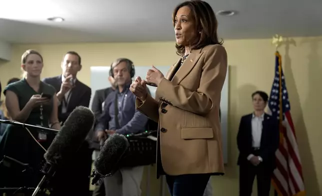 Democratic presidential nominee Vice President Kamala Harris speaks to reporters in Philadelphia, Thursday, Oct. 24, 2024. (AP Photo/Matt Rourke)