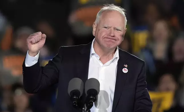 Democratic vice presidential nominee Minnesota Gov. Tim Walz speaks during a campaign rally at Burns Park in Ann Arbor, Mich., Monday, Oct. 28, 2024. (AP Photo/Carlos Osorio)