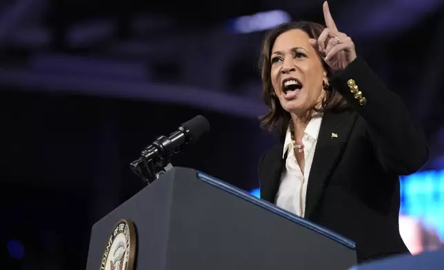 Democratic presidential nominee Vice President Kamala Harris speaks at a campaign rally at East Carolina University in Greenville, N.C., Sunday, Oct. 12, 2024. (AP Photo/Susan Walsh)