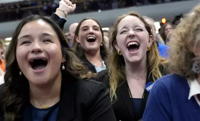 Attendees cheer as Democratic presidential nominee Vice President Kamala Harris speaks during a campaign rally at the University of Wisconsin La Crosse, in La Crosse, Wis., Thursday, Oct. 17, 2024. (AP Photo/Jacquelyn Martin)