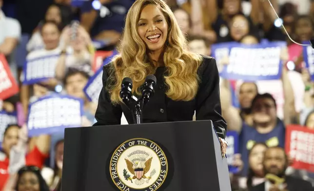 Musical artist Beyonce on stage at a campaign event for Democratic presidential nominee Vice President Kamala Harris, Friday, Oct. 25, 2024, in Houston. (AP Photo/Annie Mulligan)