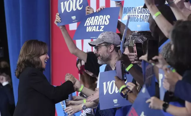 Democratic presidential nominee Vice President Kamala Harris arrives to speak at a rally at the Coastal Credit Union Music Park at Walnut Creek in Raleigh, N.C., Wednesday, Oct. 30, 2024. (AP Photo/Susan Walsh)