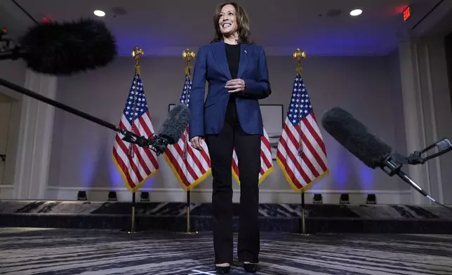 Democratic presidential nominee Vice President Kamala Harris speaks to reporters in Houston, Friday, Oct. 25, 2024. (AP Photo/Susan Walsh)