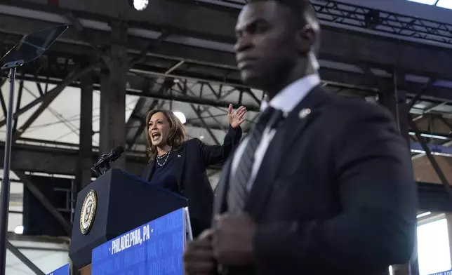 A member of the Secret Service looks on as Democratic presidential nominee Vice President Kamala Harris speaks during a community rally at the Alan Horwitz "Sixth Man" Center, Sunday, Oct. 27, 2024, in Philadelphia. (AP Photo/Susan Walsh)