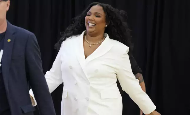 Lizzo attends a campaign event for Democratic presidential nominee Vice President Kamala Harris at Western International High School in Detroit, Saturday, Oct. 19, 2024. (AP Photo/Jacquelyn Martin)