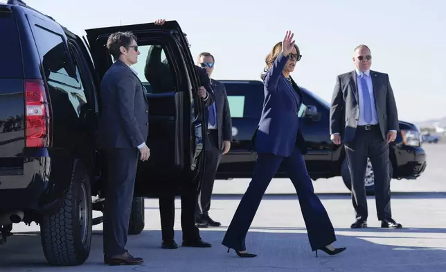 Democratic presidential nominee Vice President Kamala Harris walks to board Air Force Two in Las Vegas, Monday, Sept. 30, 2024, en route to Washington. (AP Photo/Carolyn Kaster)