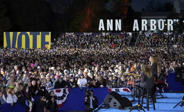 Maggie Rogers performs at a campaign event for Democratic presidential nominee Vice President Kamala Harris in Burns Park Monday, Oct. 28, 2024, in Ann Arbor, Mich. (AP Photo/Paul Sancya)