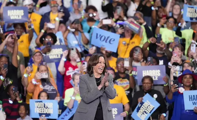 Democratic presidential nominee Vice President Kamala Harris reacts to the crowd during a campaign event at Lakewood Amphitheatre, Saturday, Oct. 19, 2024, in Atlanta. (AP Photo/Brynn Anderson)