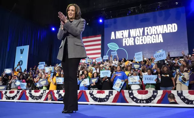 Democratic presidential nominee Vice President Kamala Harris reacts to the crowd after speaking during a campaign event at Lakewood Amphitheatre, Saturday, Oct. 19, 2024, in Atlanta. (AP Photo/Jacquelyn Martin)