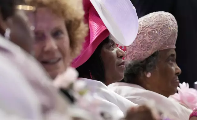 Attendees sit during a church service at New Birth Baptist Church before Democratic presidential nominee Vice President Kamala Harris speaks, in Stonecrest, Ga., Sunday, Oct. 20, 2024. (AP Photo/Jacquelyn Martin)