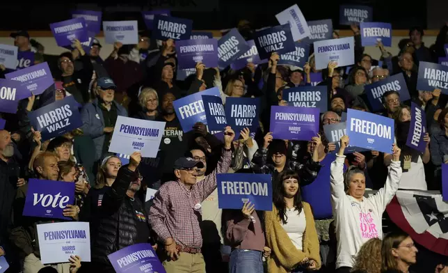 Supporters cheer as Sen. John Fetterman, D-Pa., arrives to speak at a campaign rally for Democratic presidential nominee Vice President Kamala Harris at Erie Insurance Arena, in Erie, Pa., Monday, Oct. 14, 2024. (AP Photo/Jacquelyn Martin)