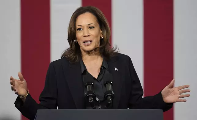 Democratic presidential nominee Vice President Kamala Harris speaks at the Redford Township Fire Department North Station, Friday, Oct. 4, 2024, in Redford Township, Mich. (AP Photo/Paul Sancya)